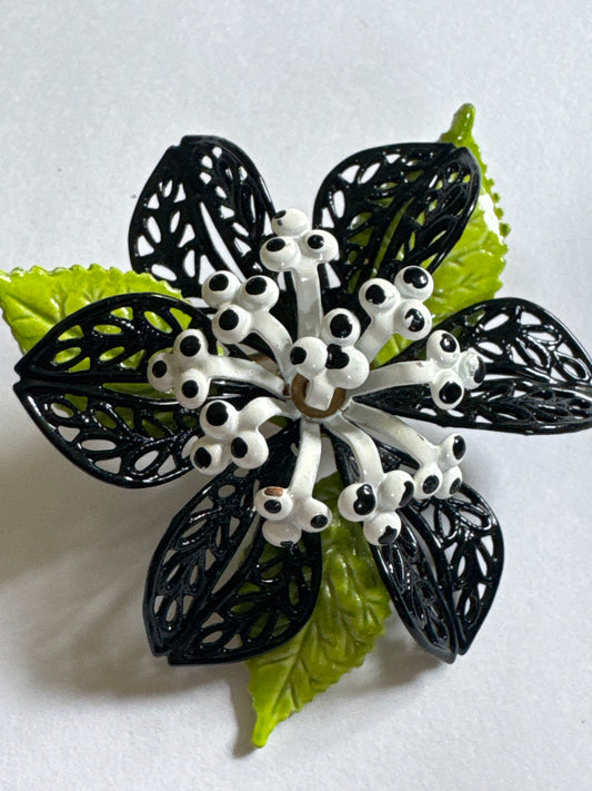 1960s black white and green enamel brooch