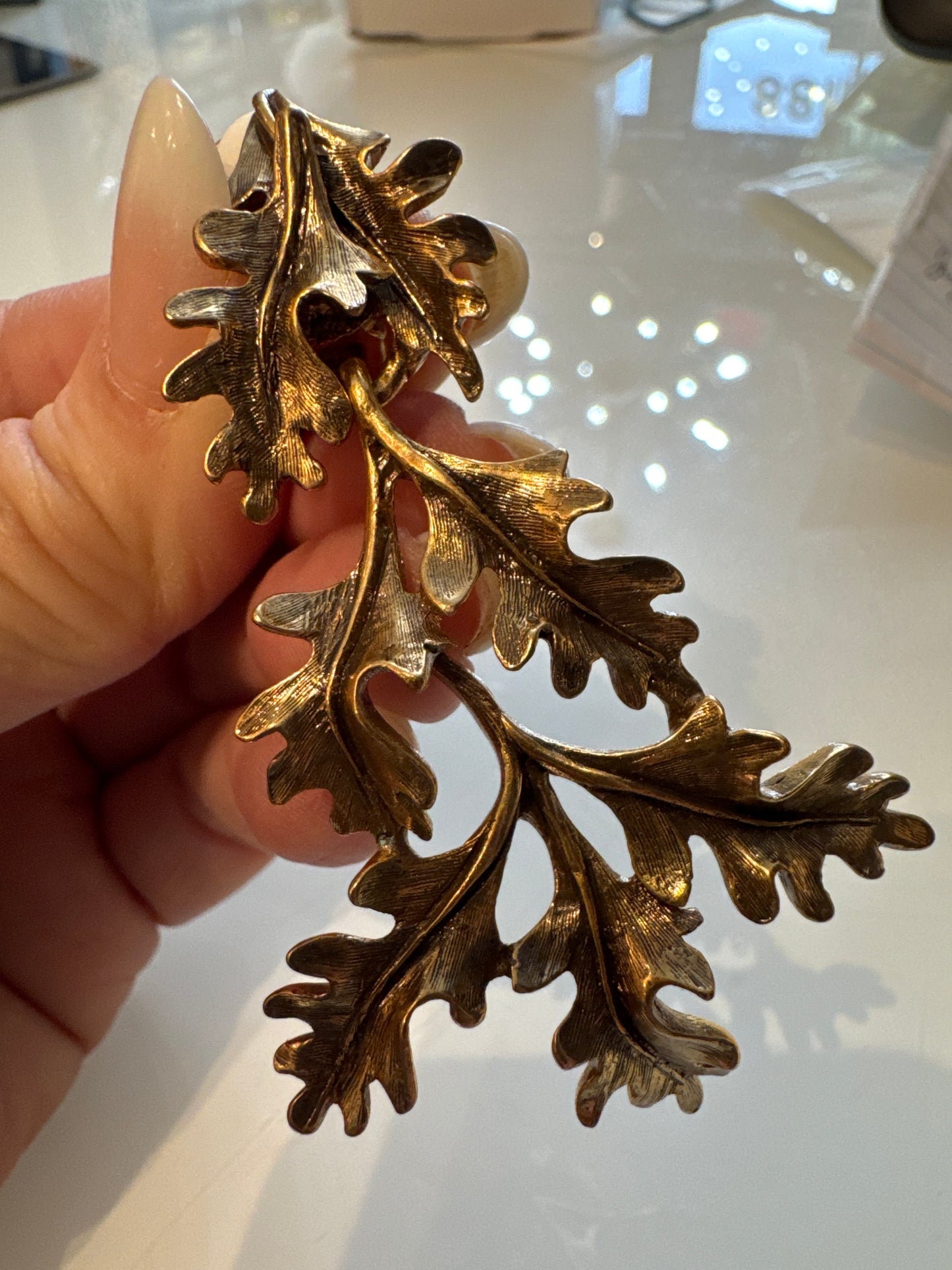 Oscar de la Renta brass tone dangle clip earrings. NYC