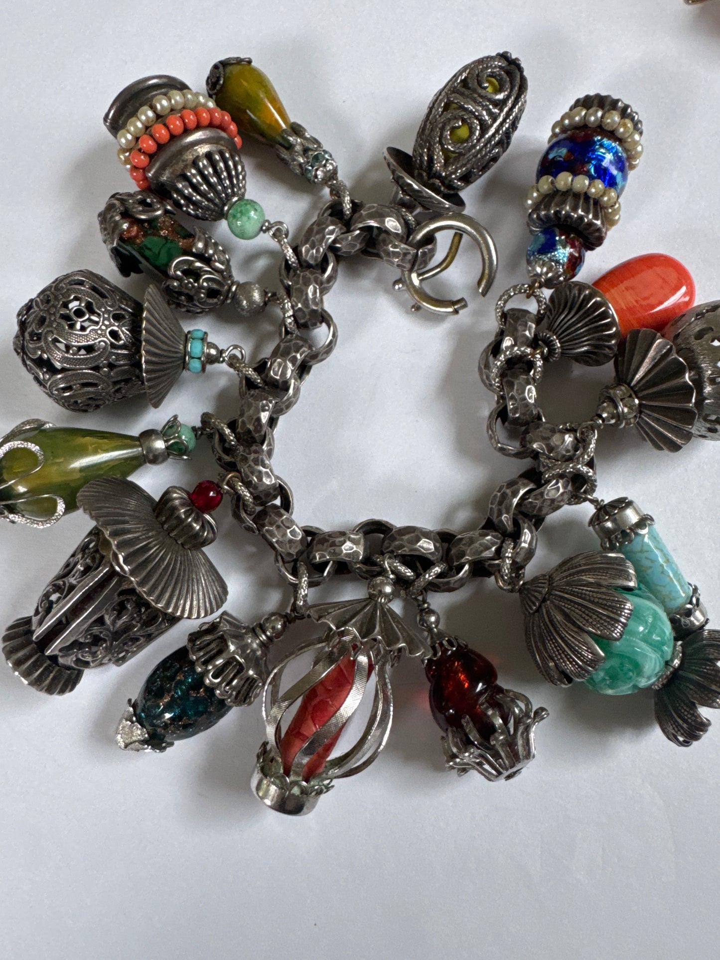 1950s signed NaPIER "latern" charm bracelet by Eugene Bertolli. Book piece on page 309 of The Napier Co.