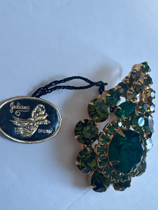 OMG!! We found one! an original D & E Juliana brooch with the hangtags still attached! Such an amazing collectible from 1968-68 in olivene and emerald green rhinestones