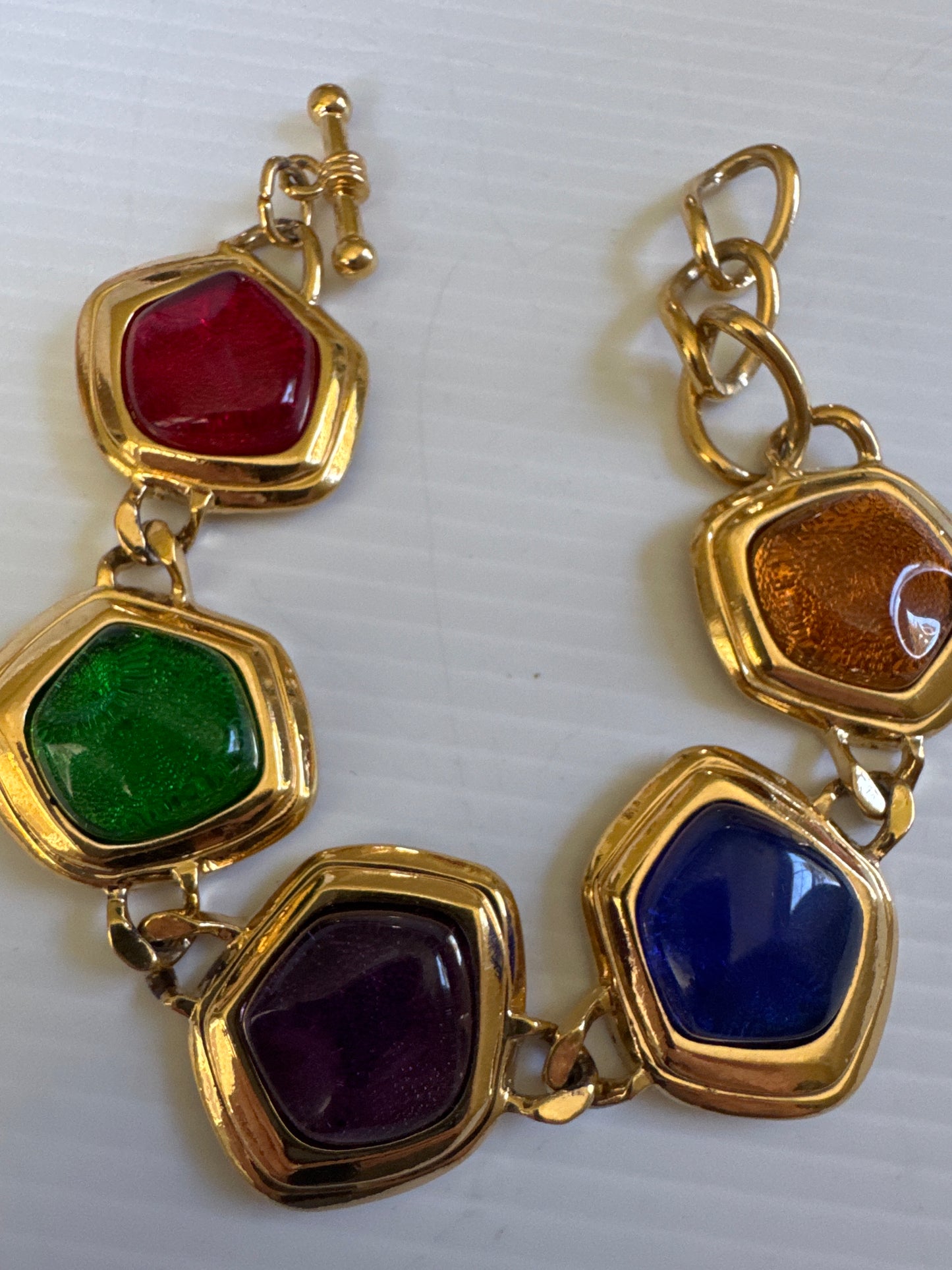 Signed vintage Avon colored cabochon gold tone bracelet