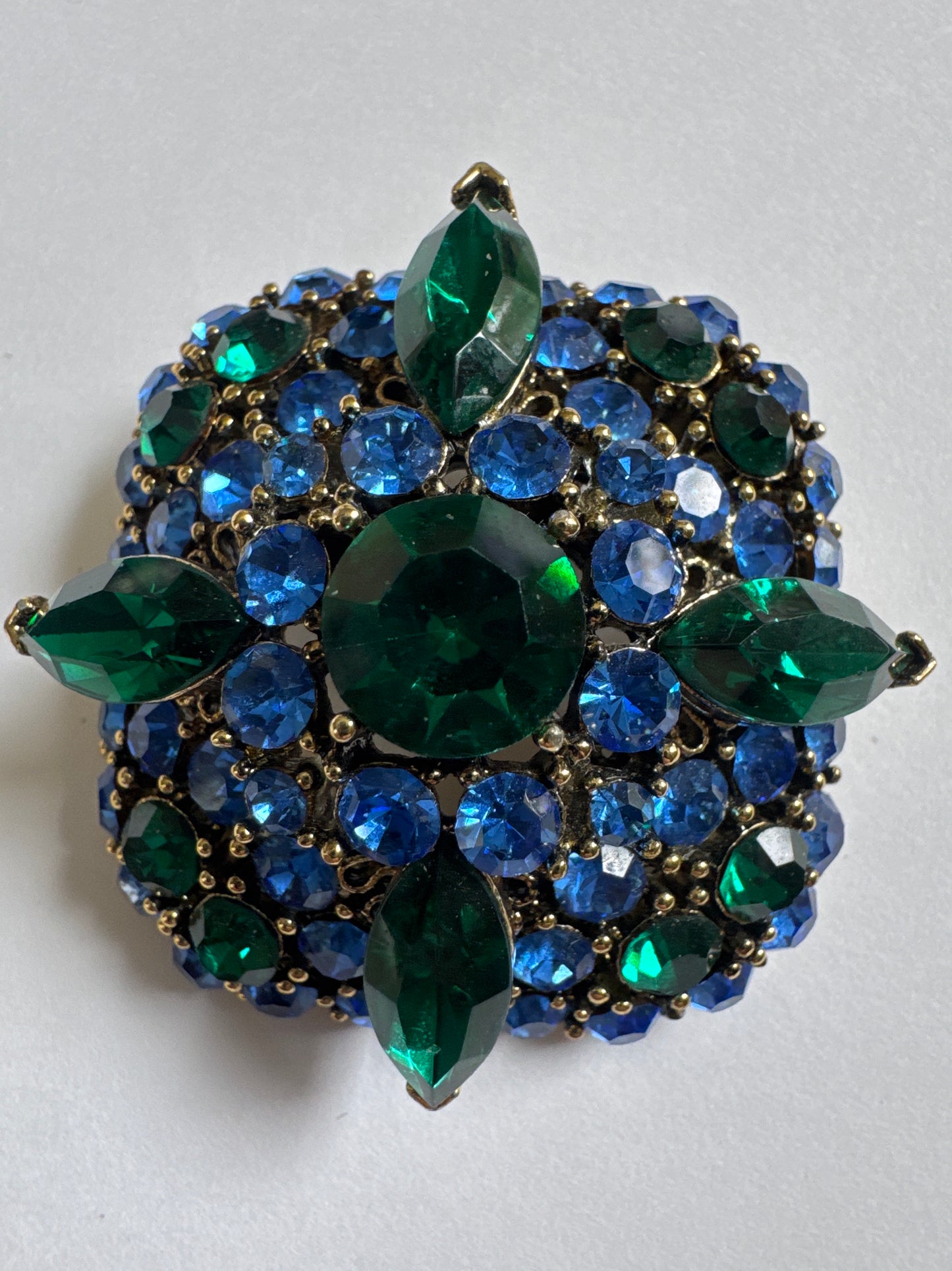 1950s signed Lisner 3 D square brooch with emerald colored and blue sapphire rhinestones