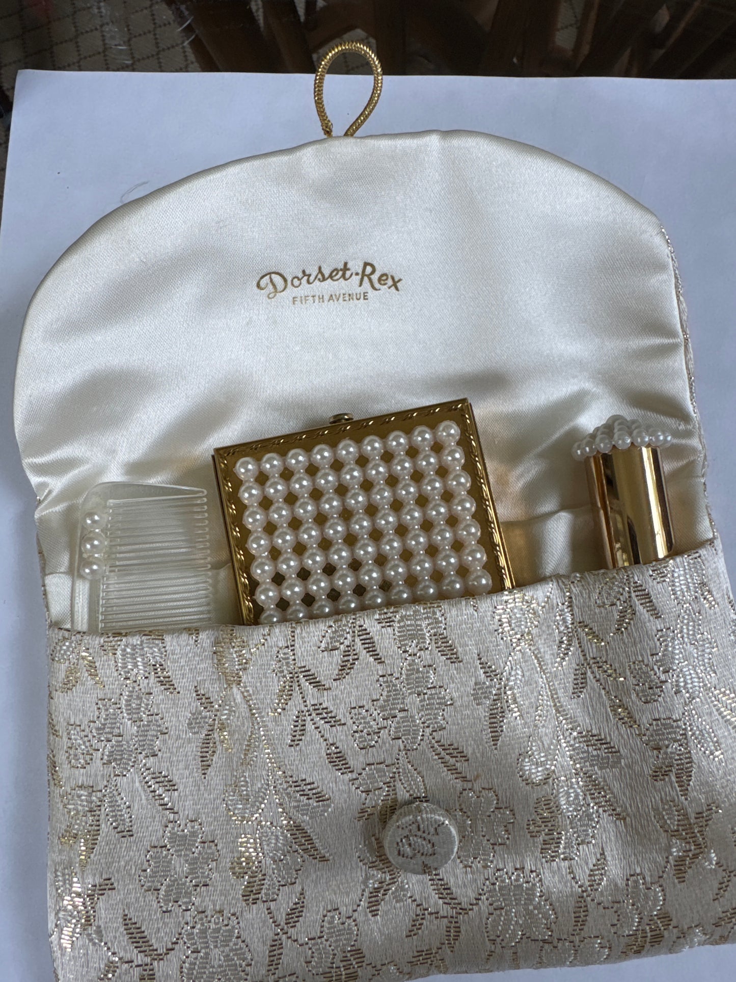 Vintage Dorset Rex 5th Ave makeup compact, lipstick holder, comb and pouch
A rare 4 piece unused cosmetics set