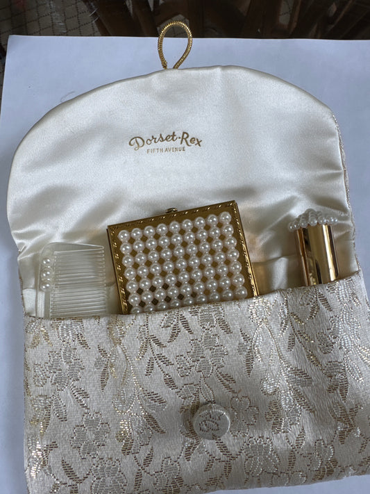 Vintage Dorset Rex 5th Ave makeup compact, lipstick holder, comb and pouch
A rare 4 piece unused cosmetics set