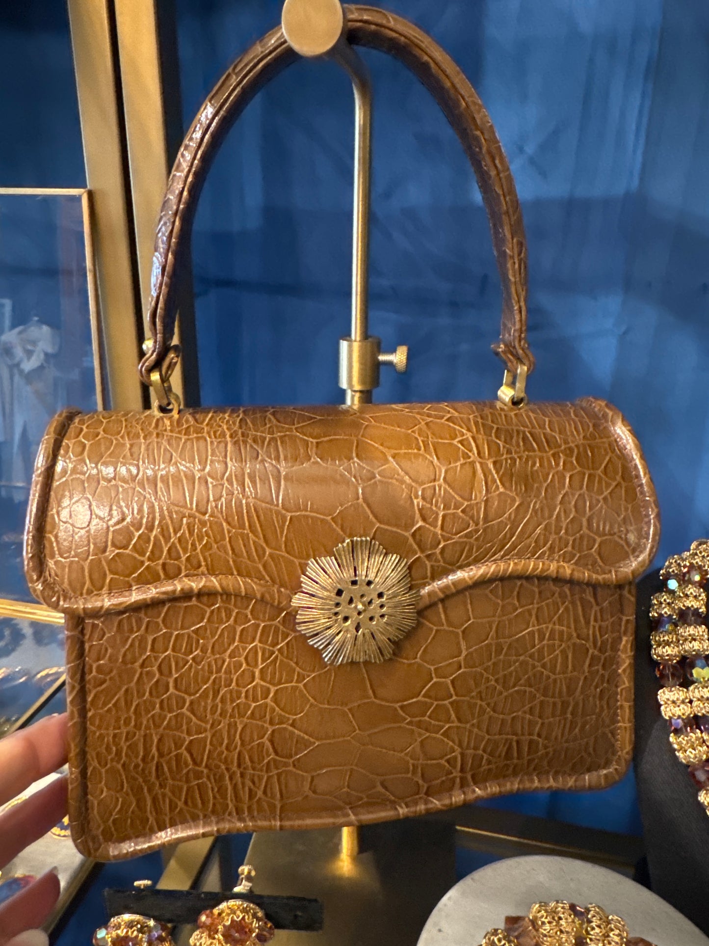 Mid-century taupe top handle embossed handbag with decorative clasp