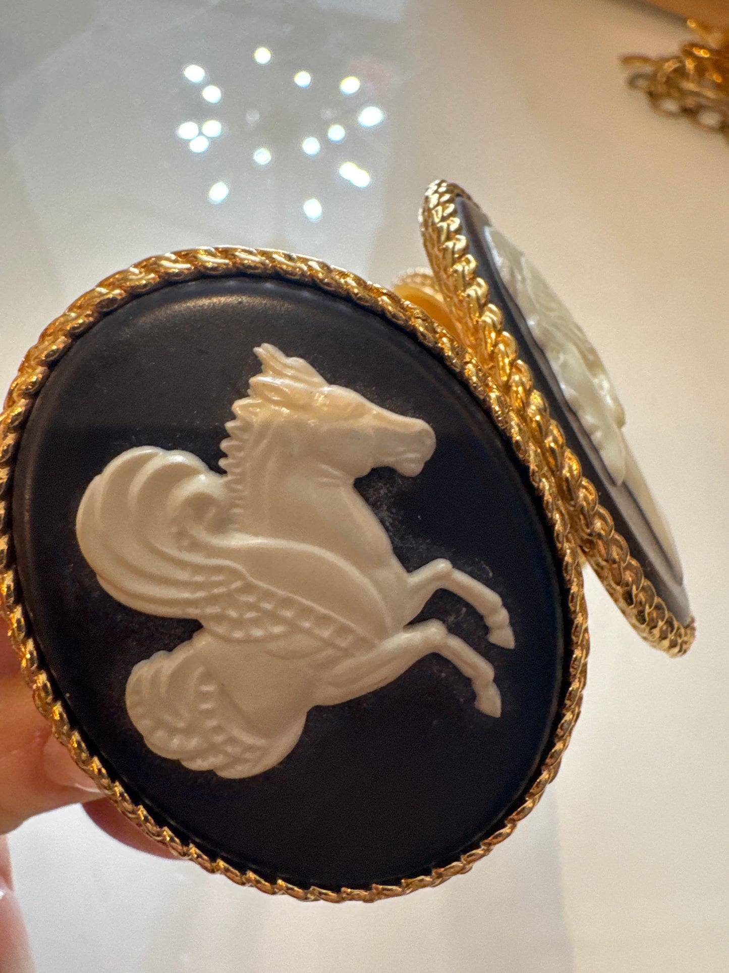 Chanel 1990s carved cameo motif large cuff bracelet with 4-cameo 2" cameo plates featuring a horse, 2 Coco portraits and a renaissance girl.