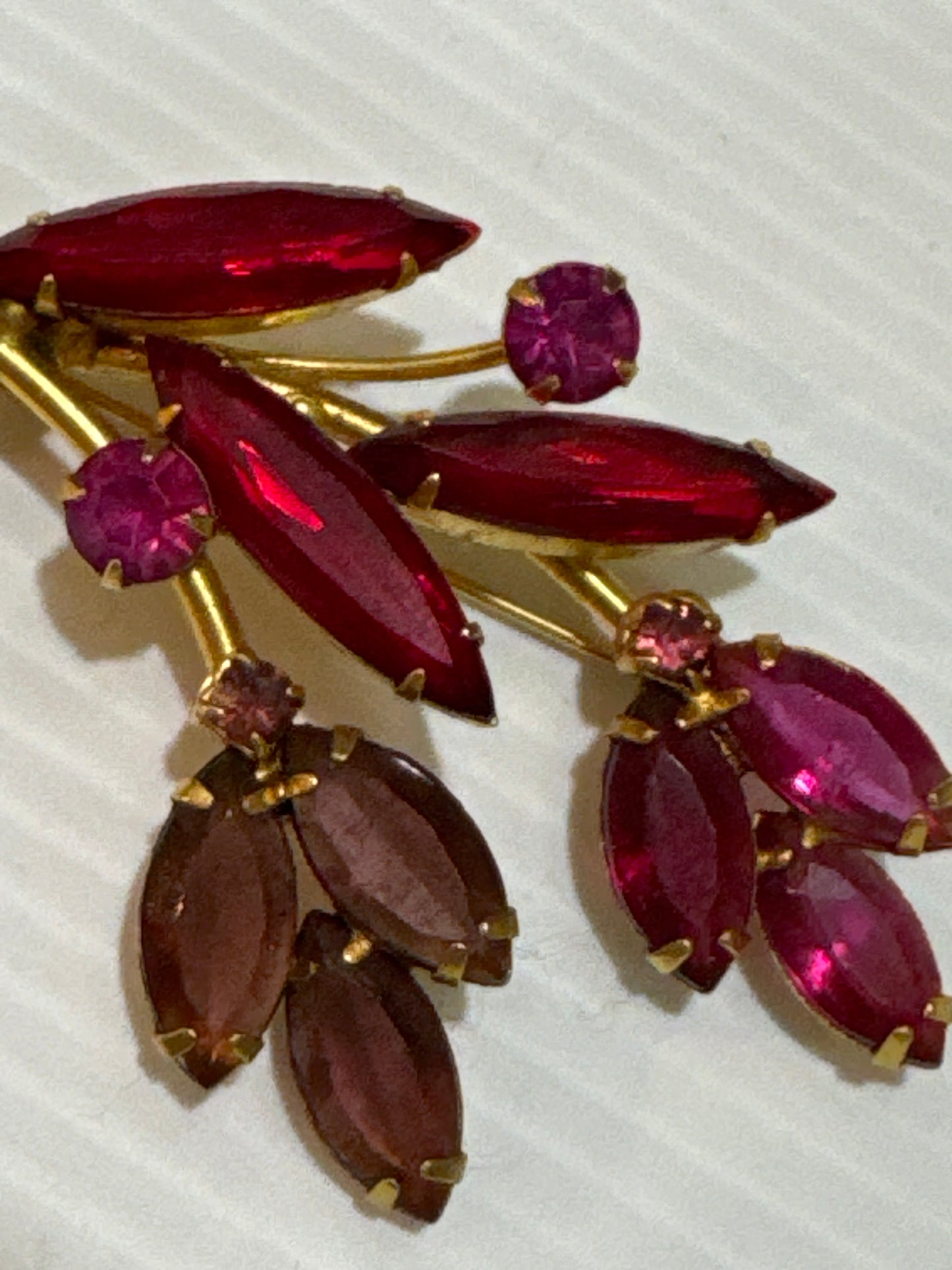 1950s beautiful red, fuchsia and amethyst colored glass rhinestone brooch. Jackpot.
