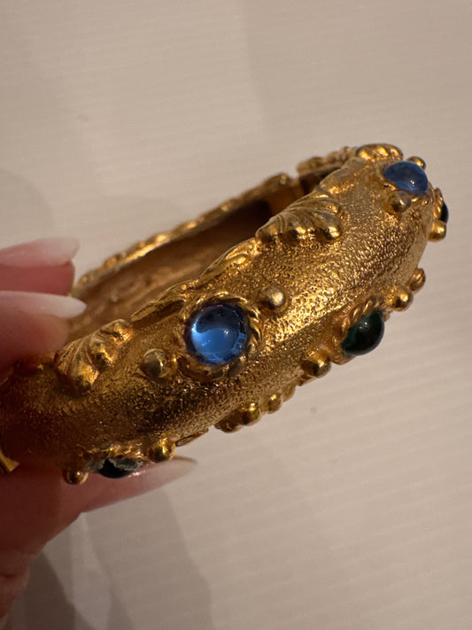 Beautiful 1980s signed YOSCA clamper bracelet with blue and green rhinestones