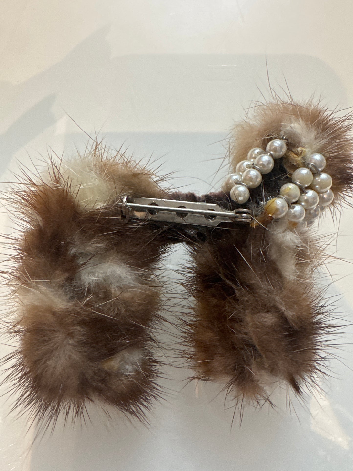 Late 1940s mink doggie brooch with googly eyes and pearl necklace