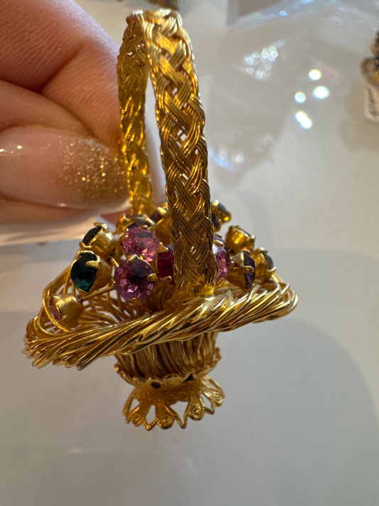 Adorable 3-D flower basket with braided handle and colorful rhinestones