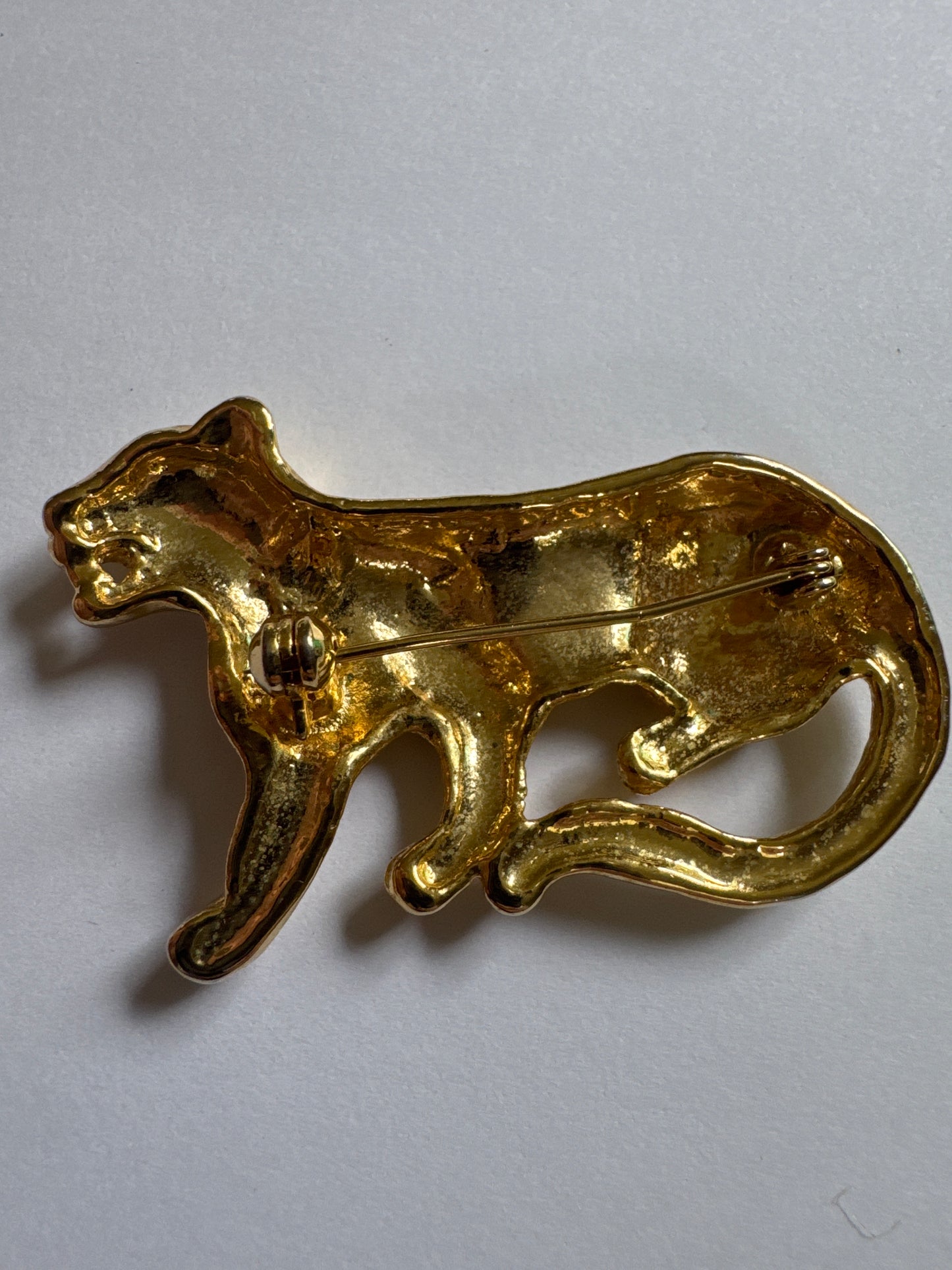 1980s gold tone with black enamel, cheetah brooch