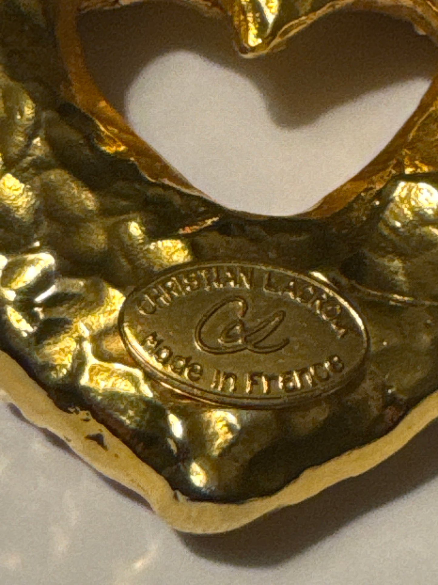 1980s signed Christian Lacroix heavy hammered gold plate brooch with glass cabochons