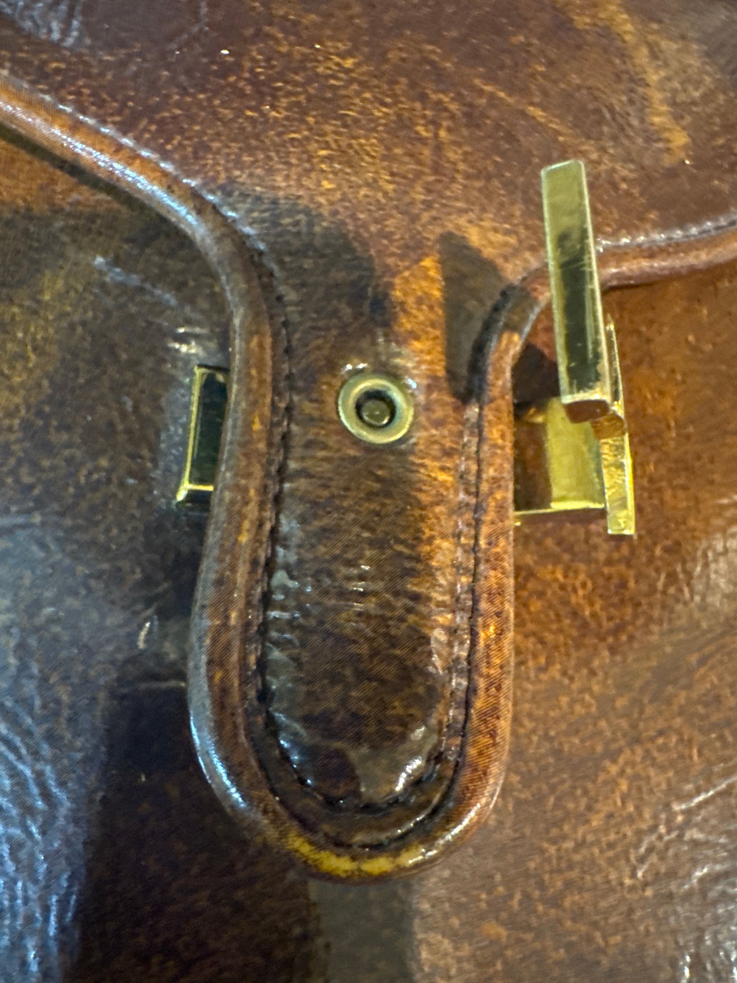 fabulous 1960s brown vinyl triple compartment handbag with chains and decorative closure