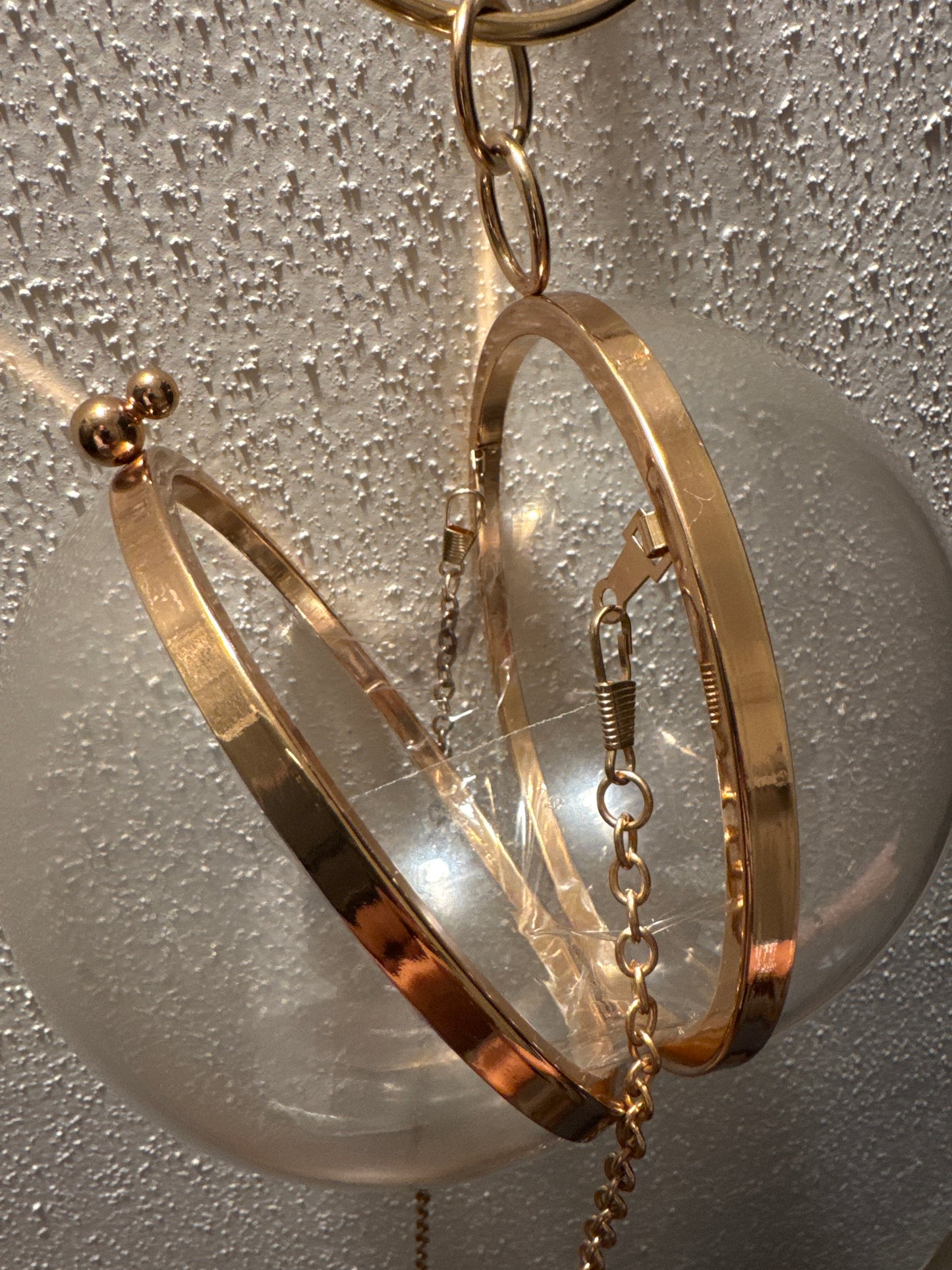 Fun 1980s mod bracelet/crossbody lucite bag with gold tone trim. crossbody strap is removable.