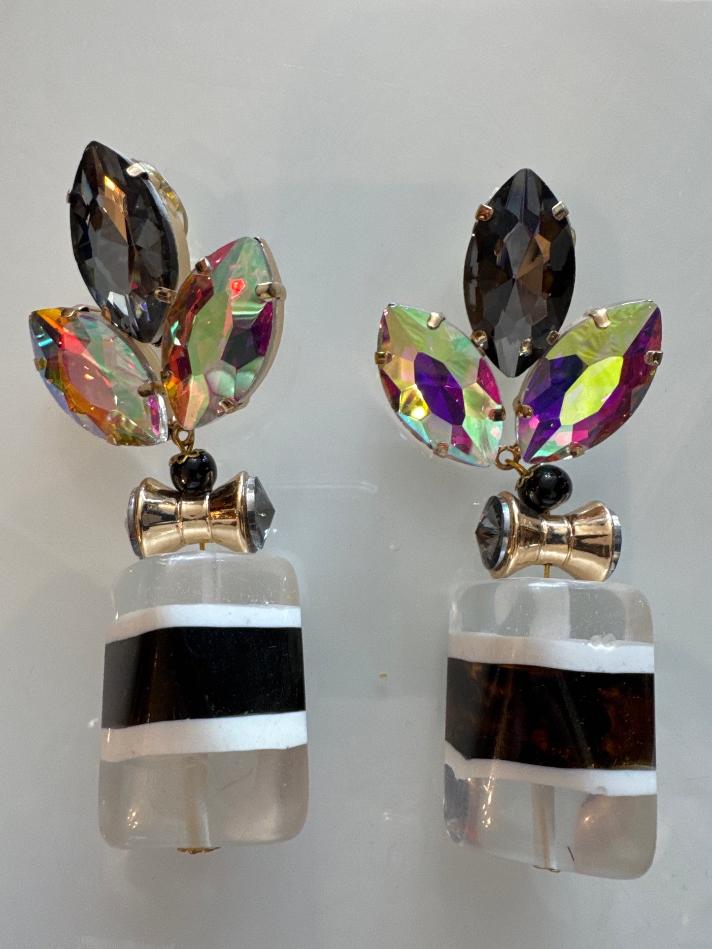Jumbo dangle clip on statement earrings direct from Paris. Paris live.