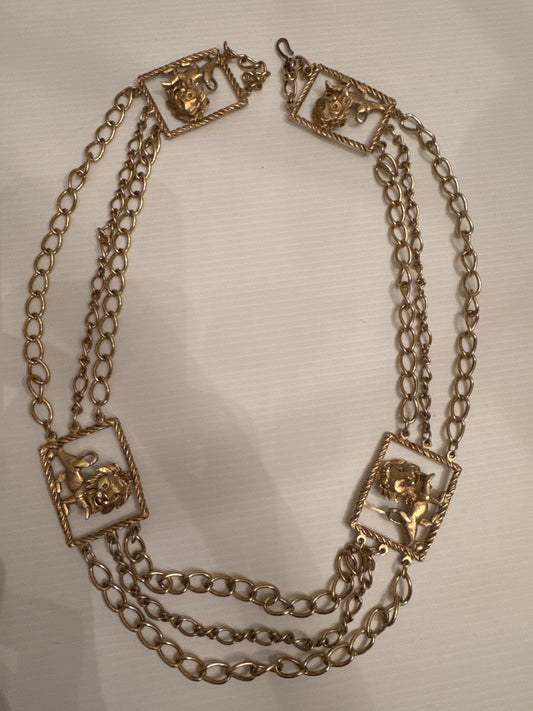 Vintage 1970s gold tone, lion embellished belt
