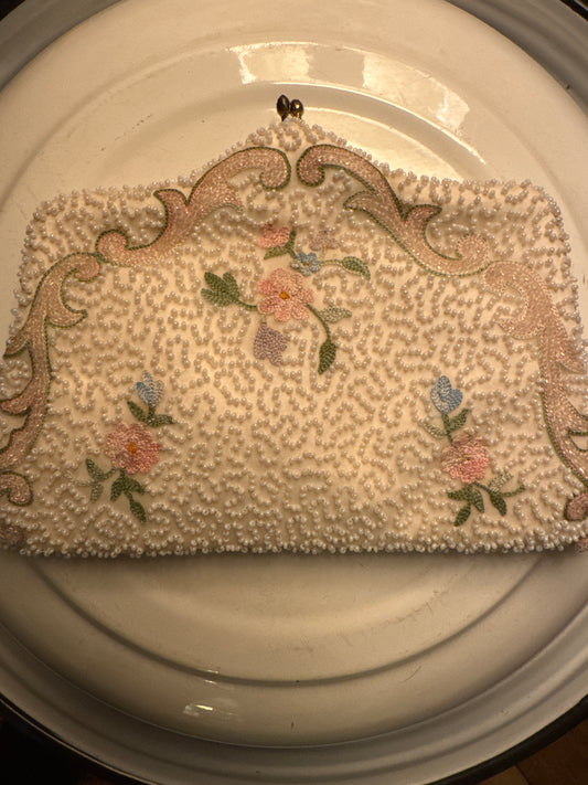 stunning vintage white beaded clutch bag with kiss lock, petite pointe flowers. Sourced in Paris.