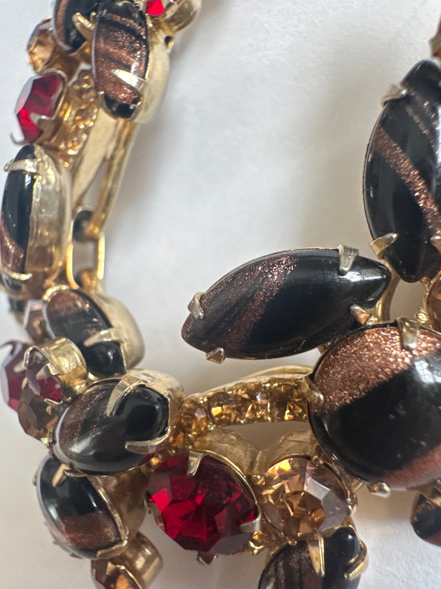 WOW! Rare D & E Juliana multi layered black bracelet with red and topaz rhinestones along with black and gold confetti style stones