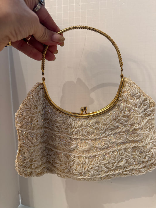 1950s white beaded kiss lock bag with gold bracelet handle
