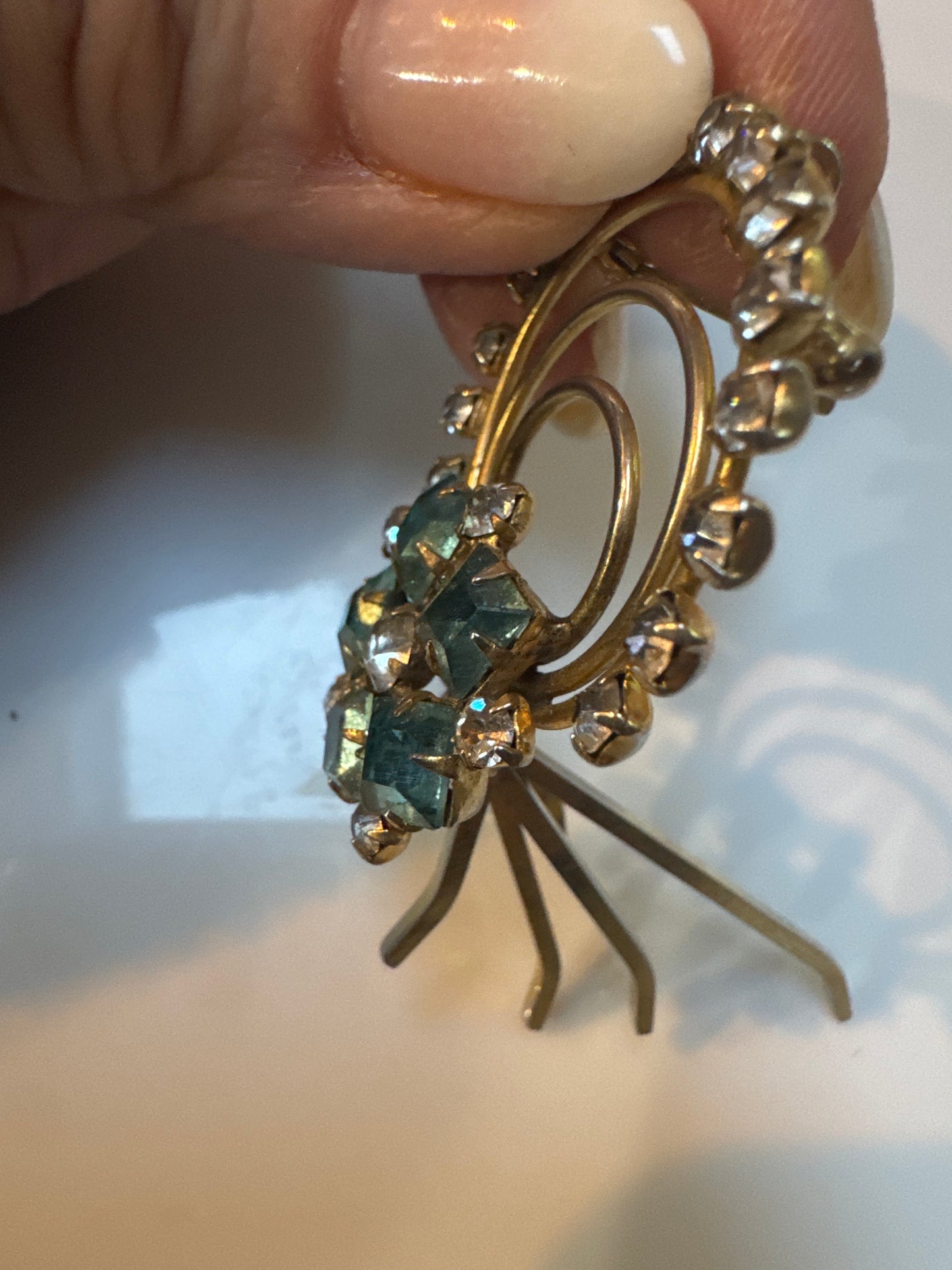 1930s articulated dangling pendant with aquamarine and clear rhinestones