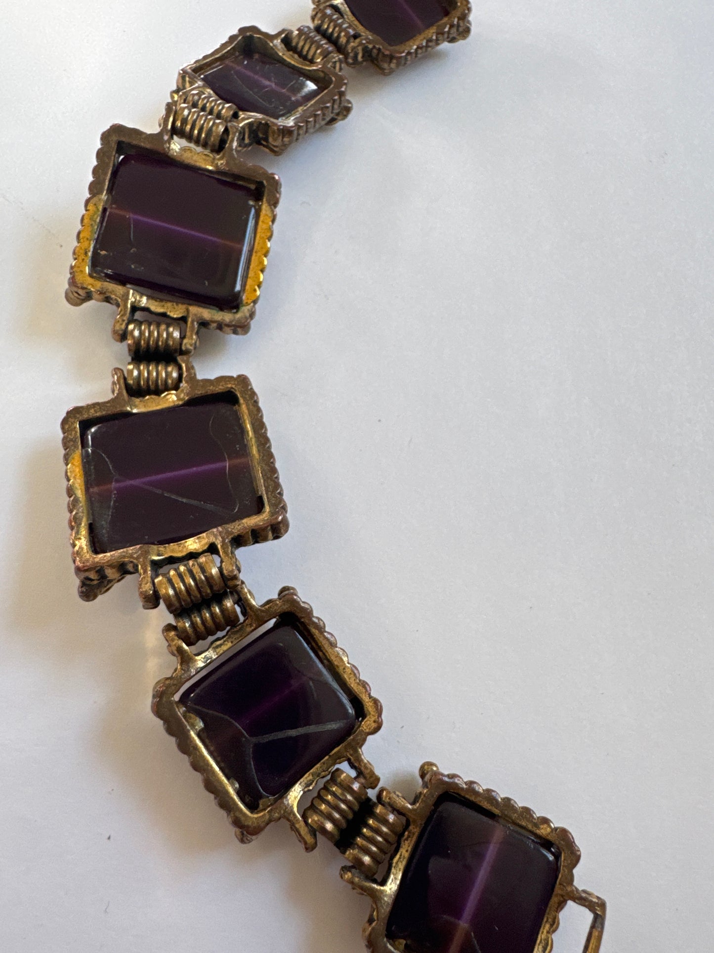 Beautiful 1960s vintage thermoset brass tone and purple stone chunky bracelet. Road