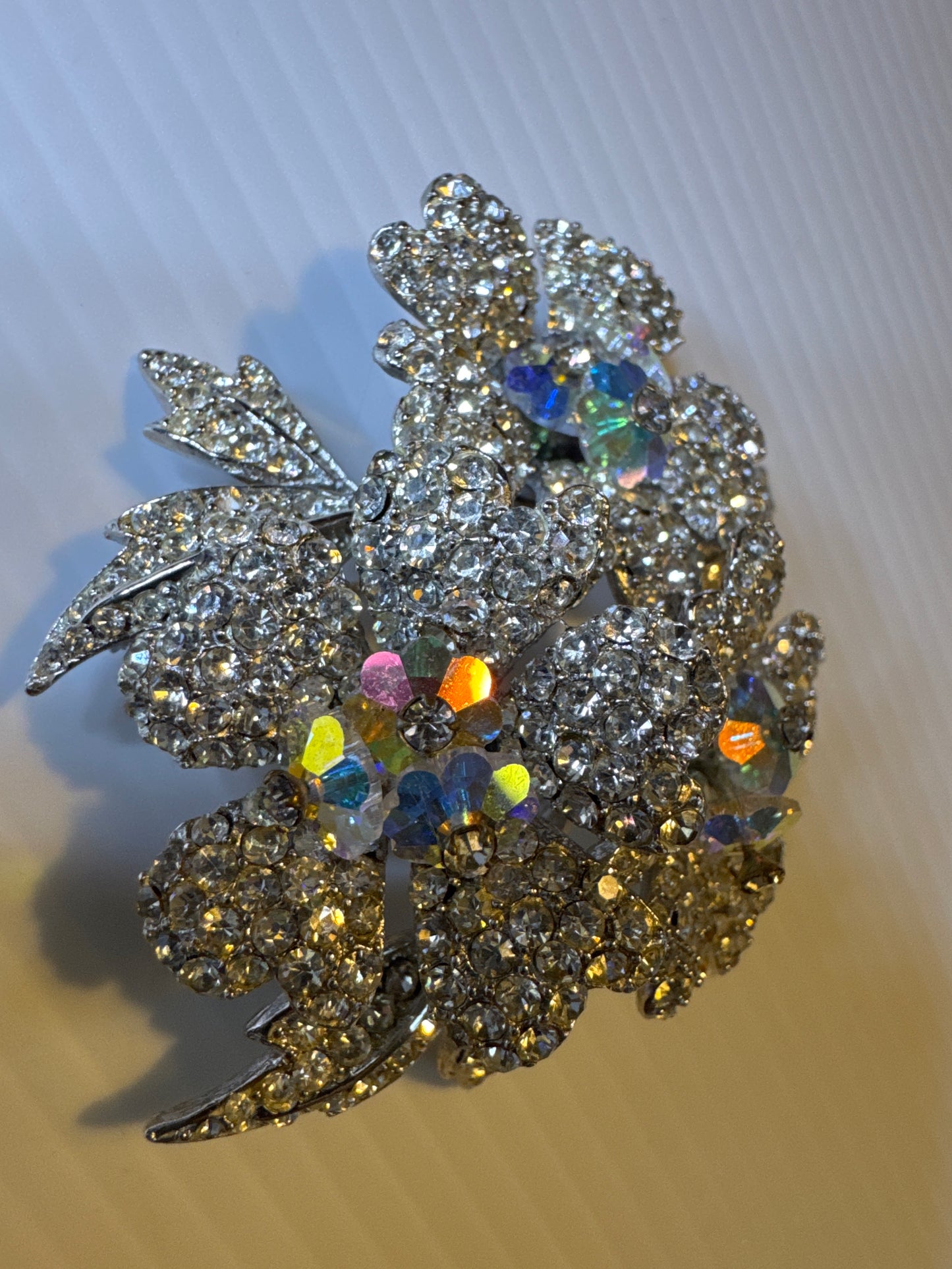Beautiful 1960s sparkling 3D rhinestone flower brooch with dangle center stones