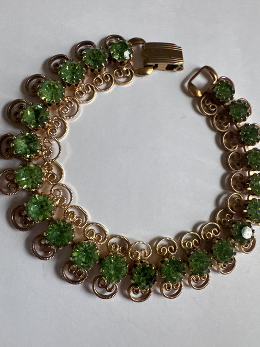 1960s delicate light green rhinestone with gold tone, filigree bracelet