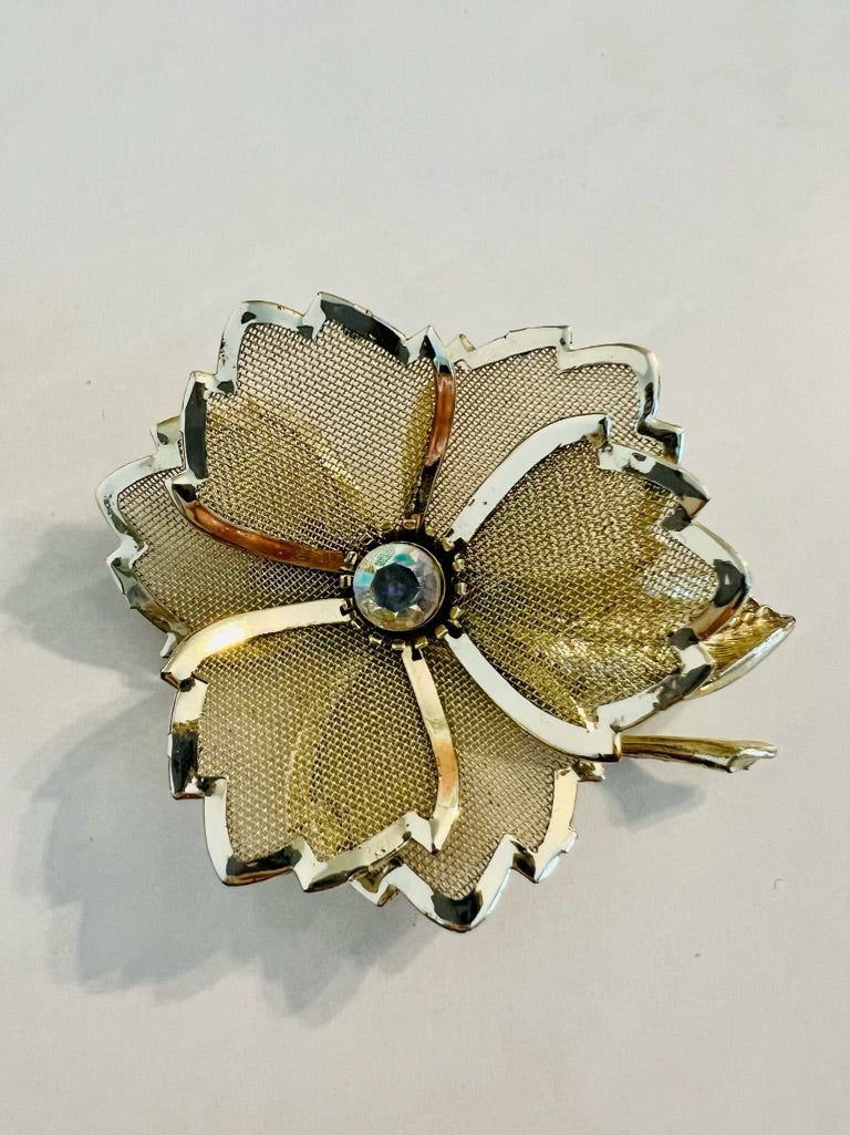 Vintage gold tone mesh flower with rhinestone center