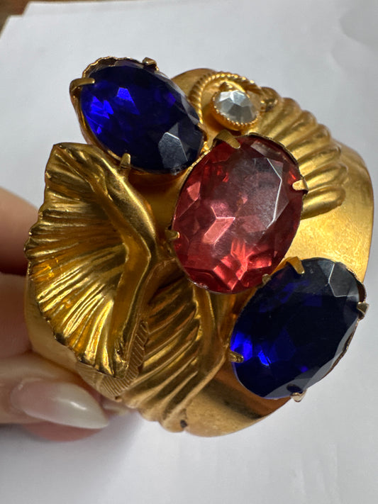 Statement 1980s decorative cuff bracelet in gold tone with blue and pink rhinestones