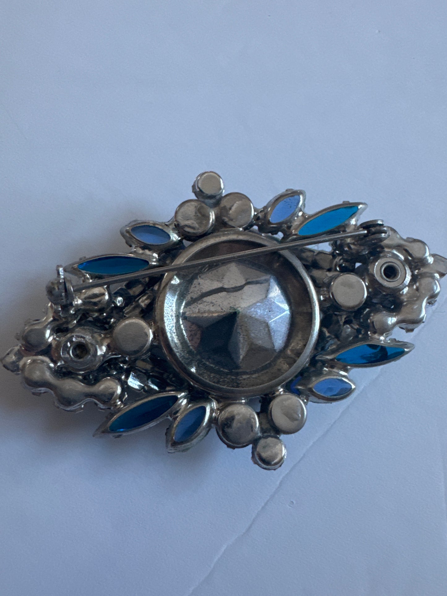 Gorgeous 1960s Juliana Montana blue rhinestone brooch with blue watermelon center stone. Photo doesn't do this piece justice!
