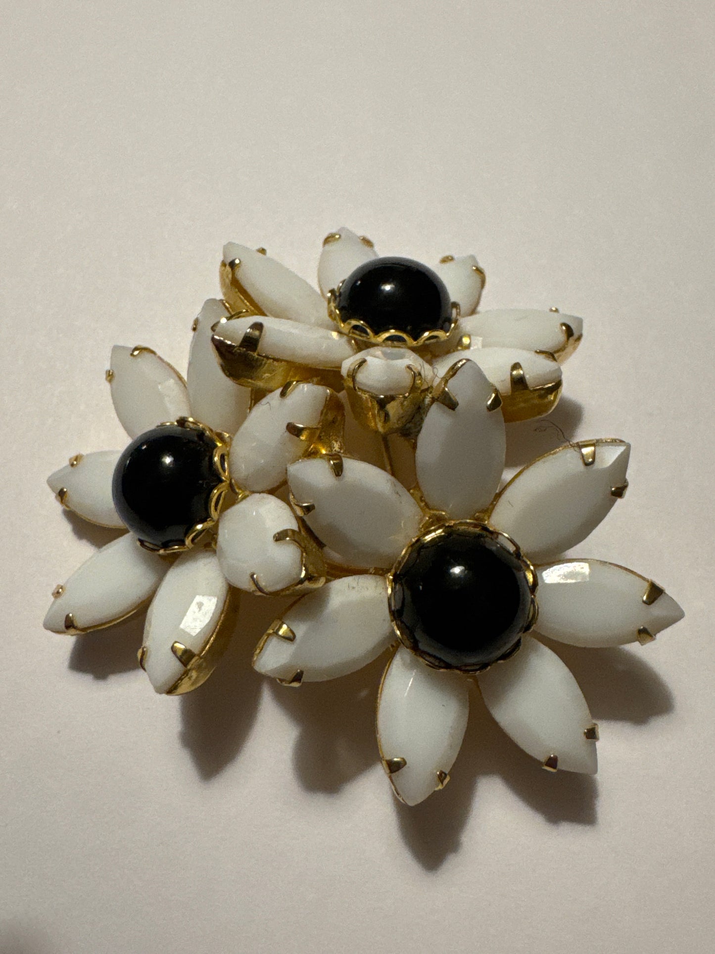 Juliana milk glass navette and black cabochon dome brooch. Road