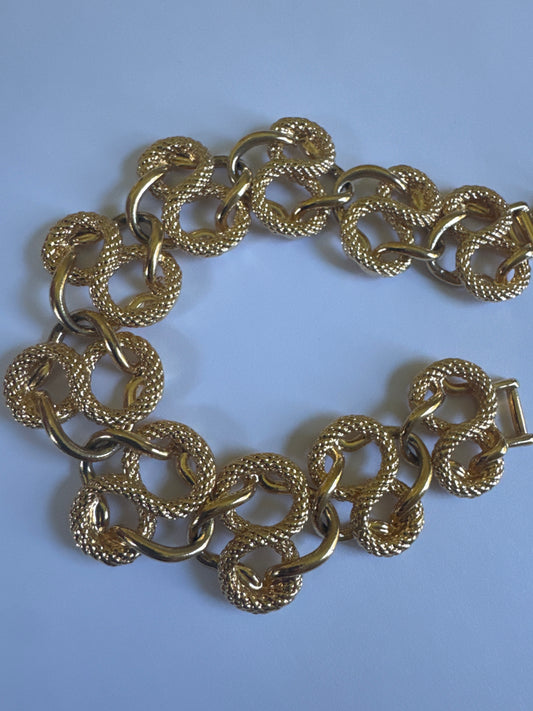 1980s swirl S link chain in gold tone signed NAPIER