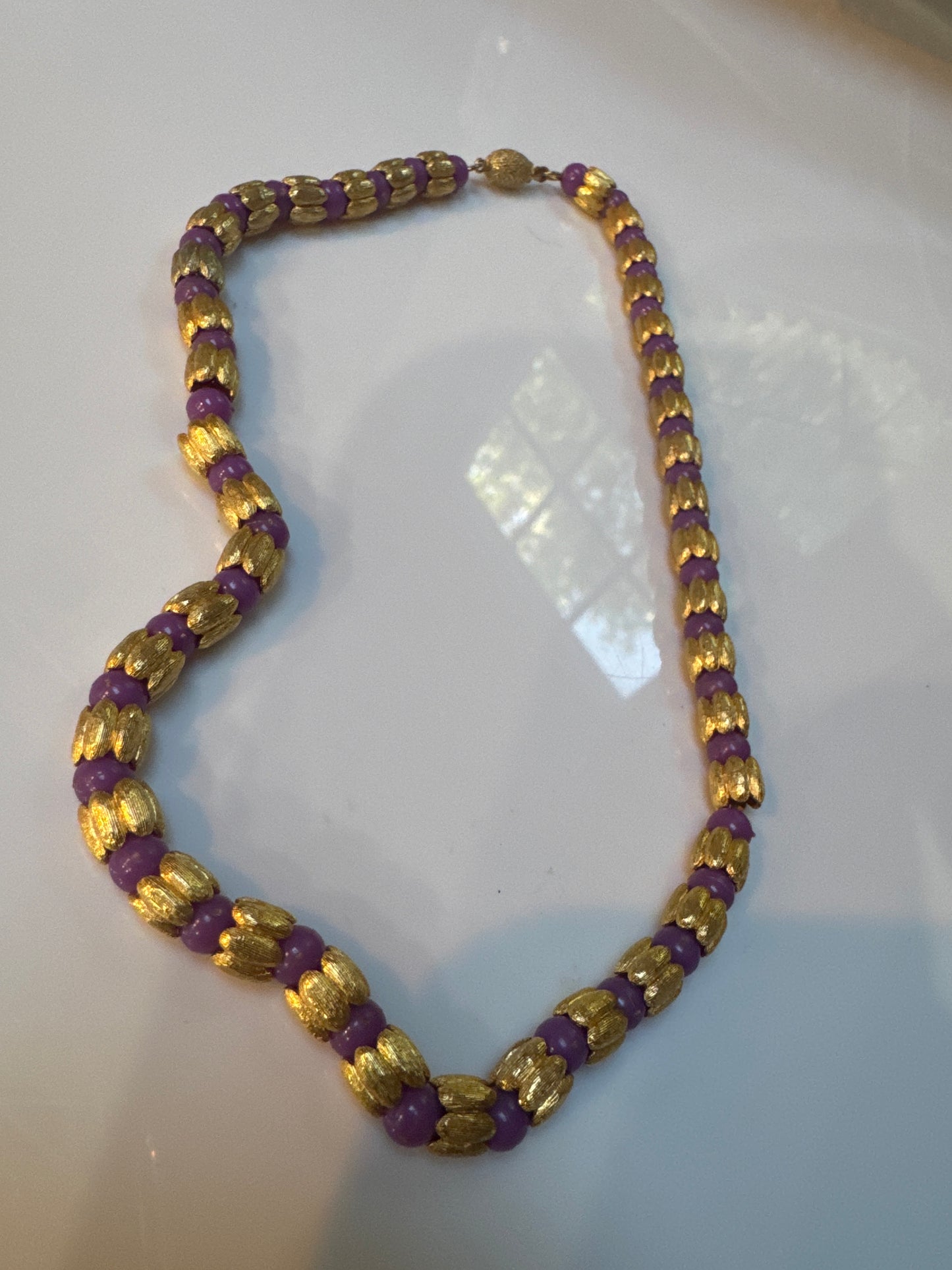 Beautiful gold tone and purple bead choker necklace