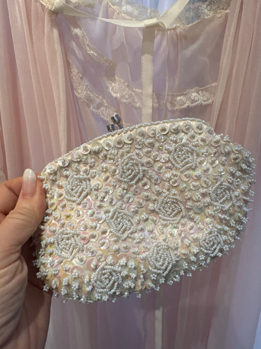 1950s beaded and sequin clutch bag with optional chain(needs re-hooking). Small lipstick stain on interior. As is.