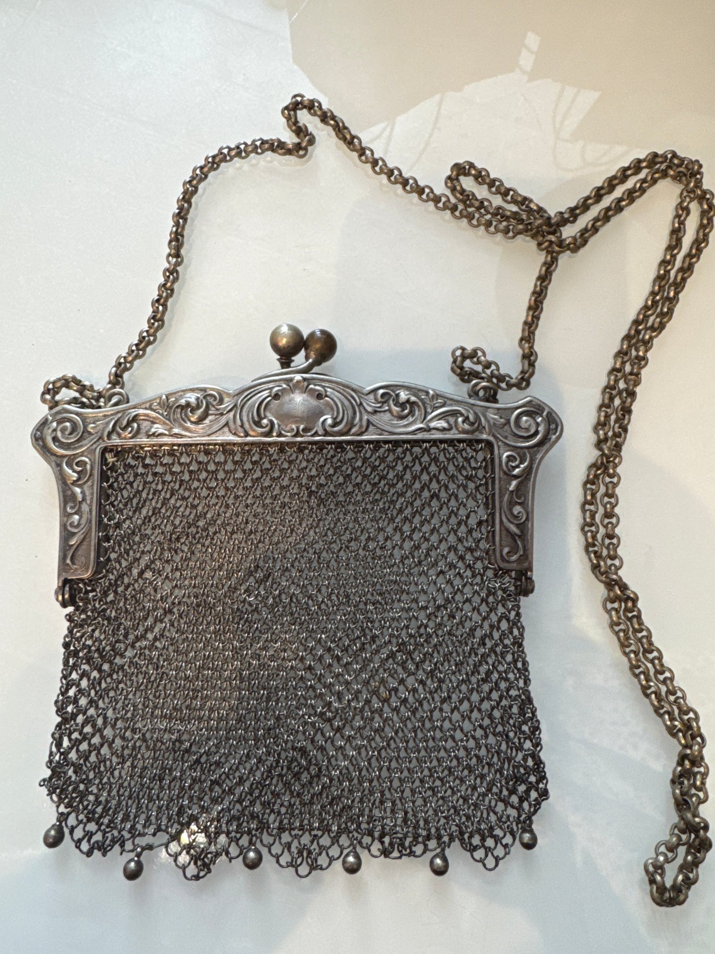 1920s pewter metal bag with long chain that can be used as a Crossbody strap or long necklace