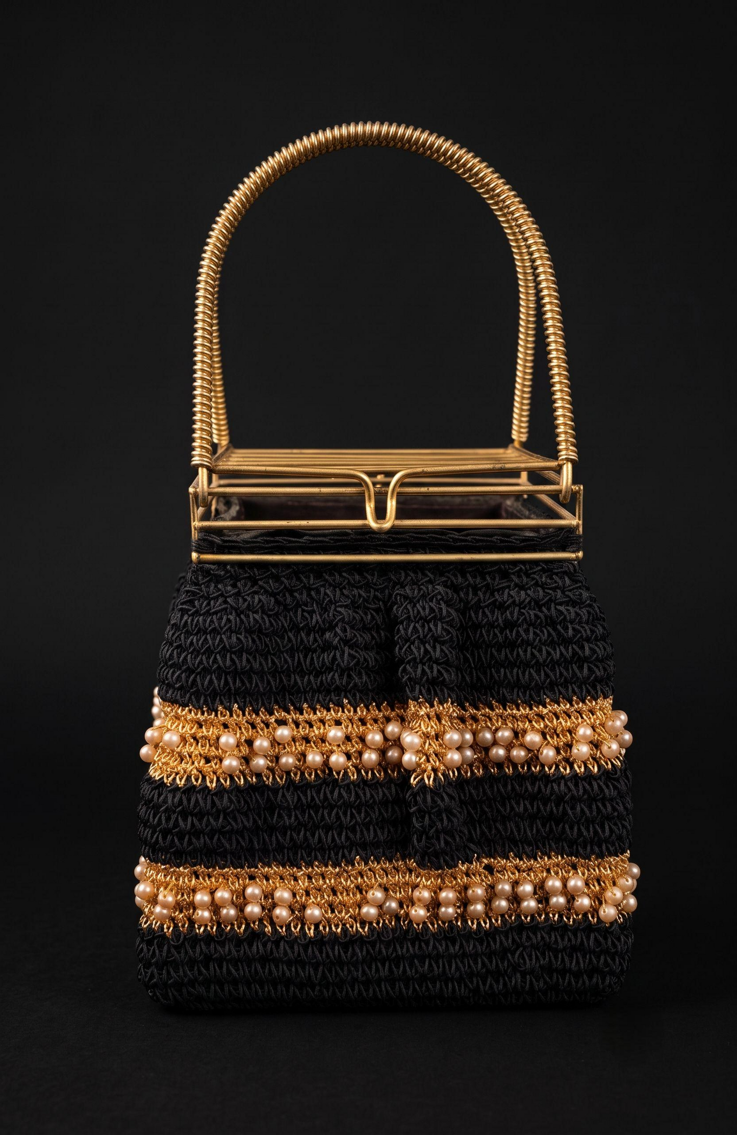 1940s crochet box bag in black with gold threading and pearls and a cage-like  top