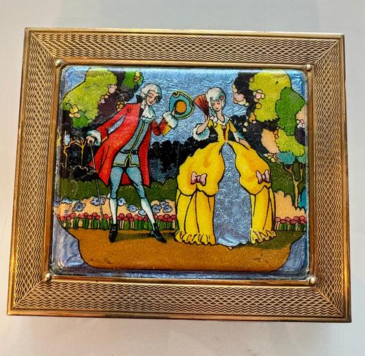 Vintage 1940s cigarette case with coupling scene made from foil.