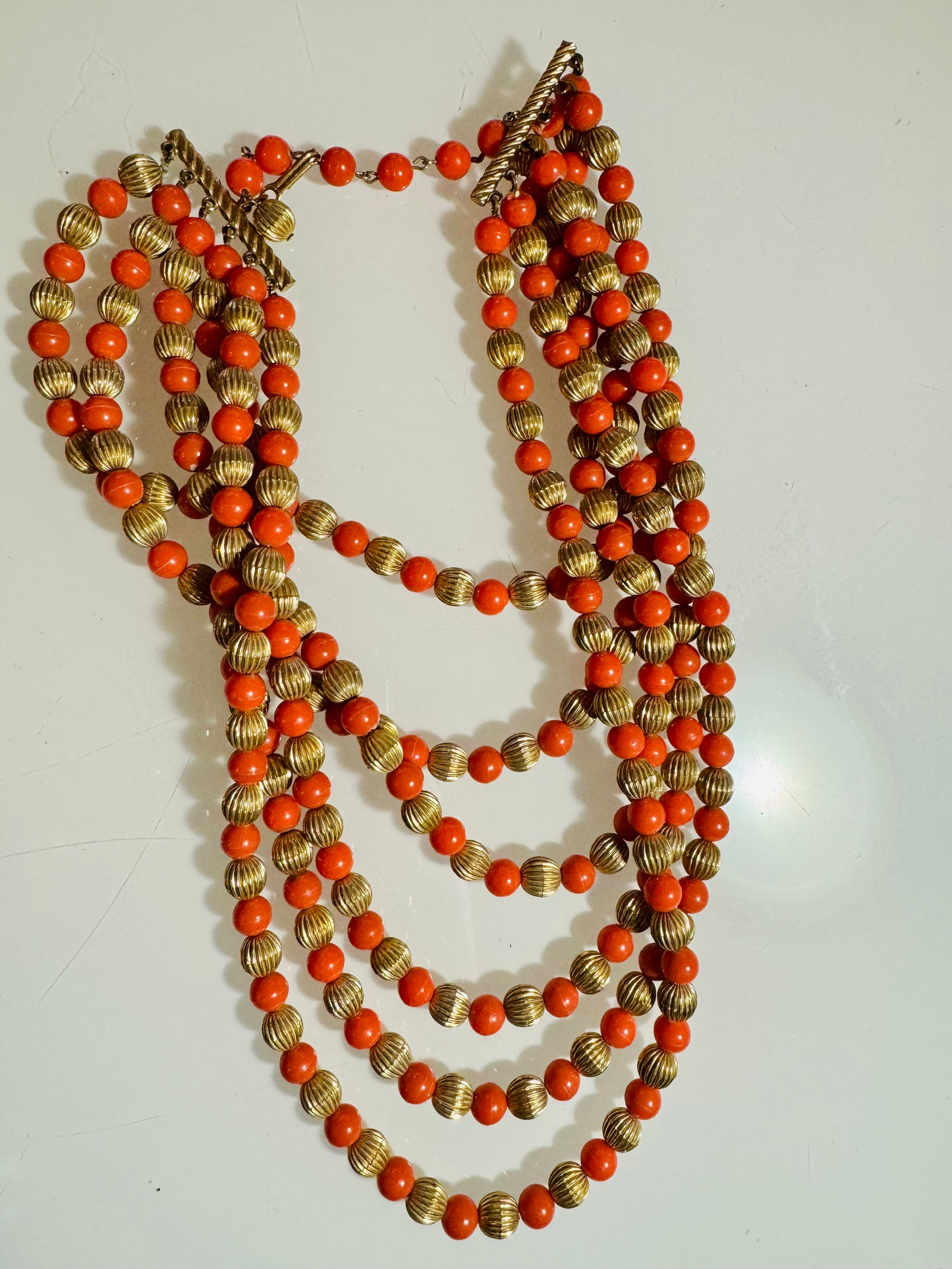 Multi Strand Orange and Gold Tone 1970s necklace