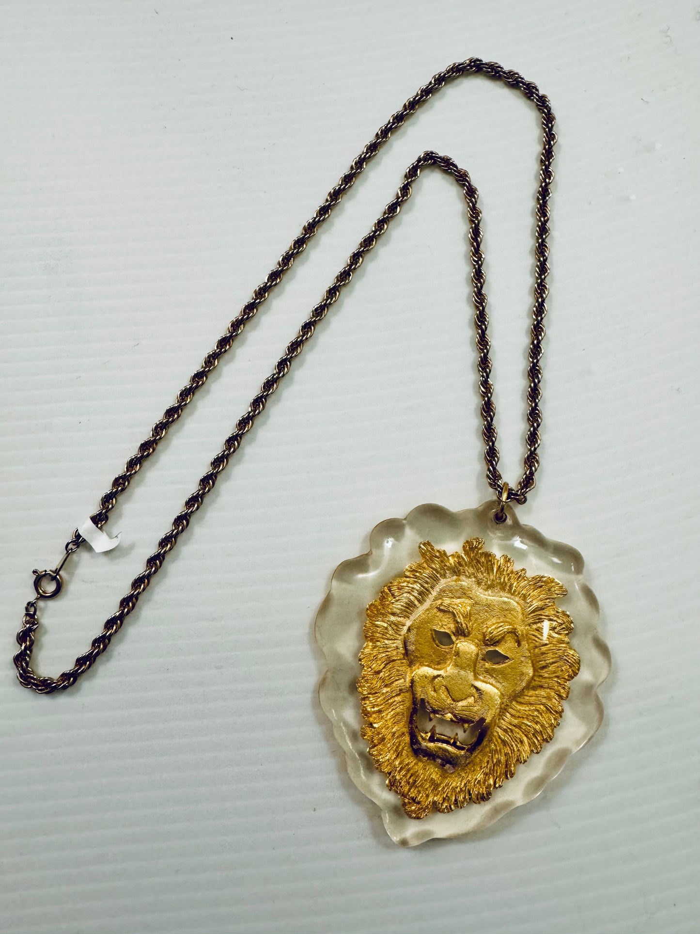 Vintage lucite with gold lion pendant