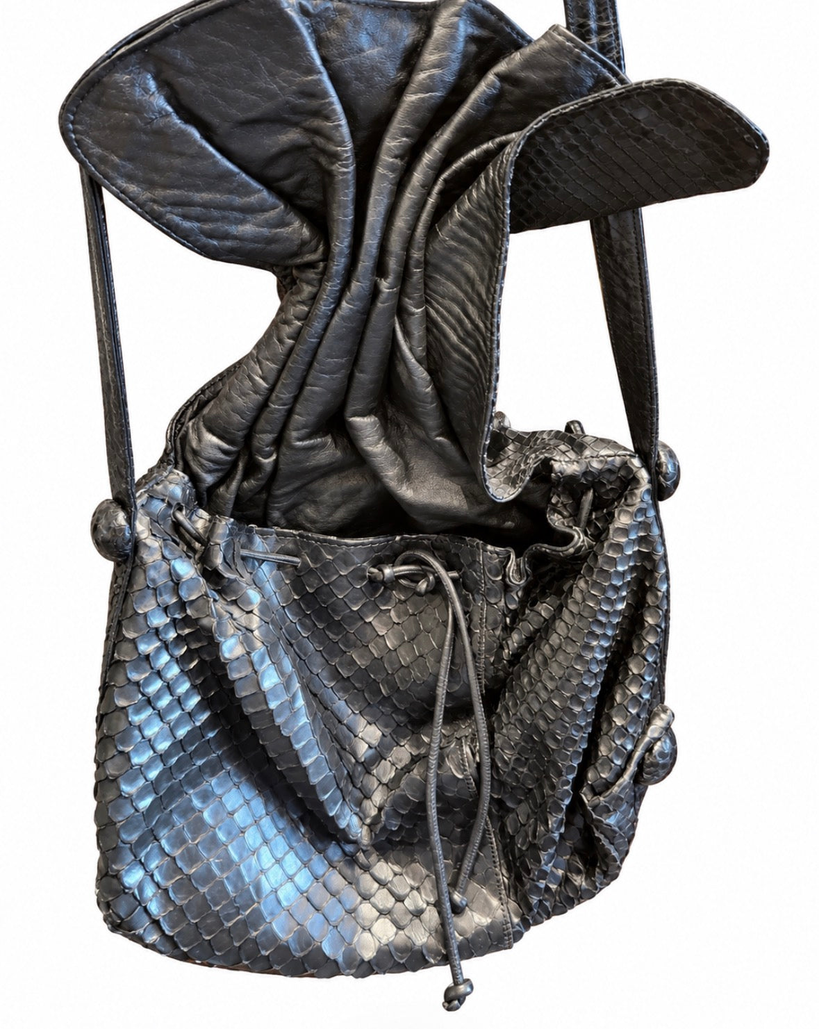 1980s black leather skin Carlos Falchi butterfly bag with extra long strap. The idea is you knot the strap to make it the desired length.