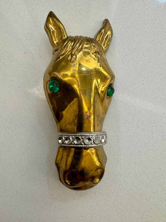 Vintage horse head brooch with green eyes and rhinestone bridle