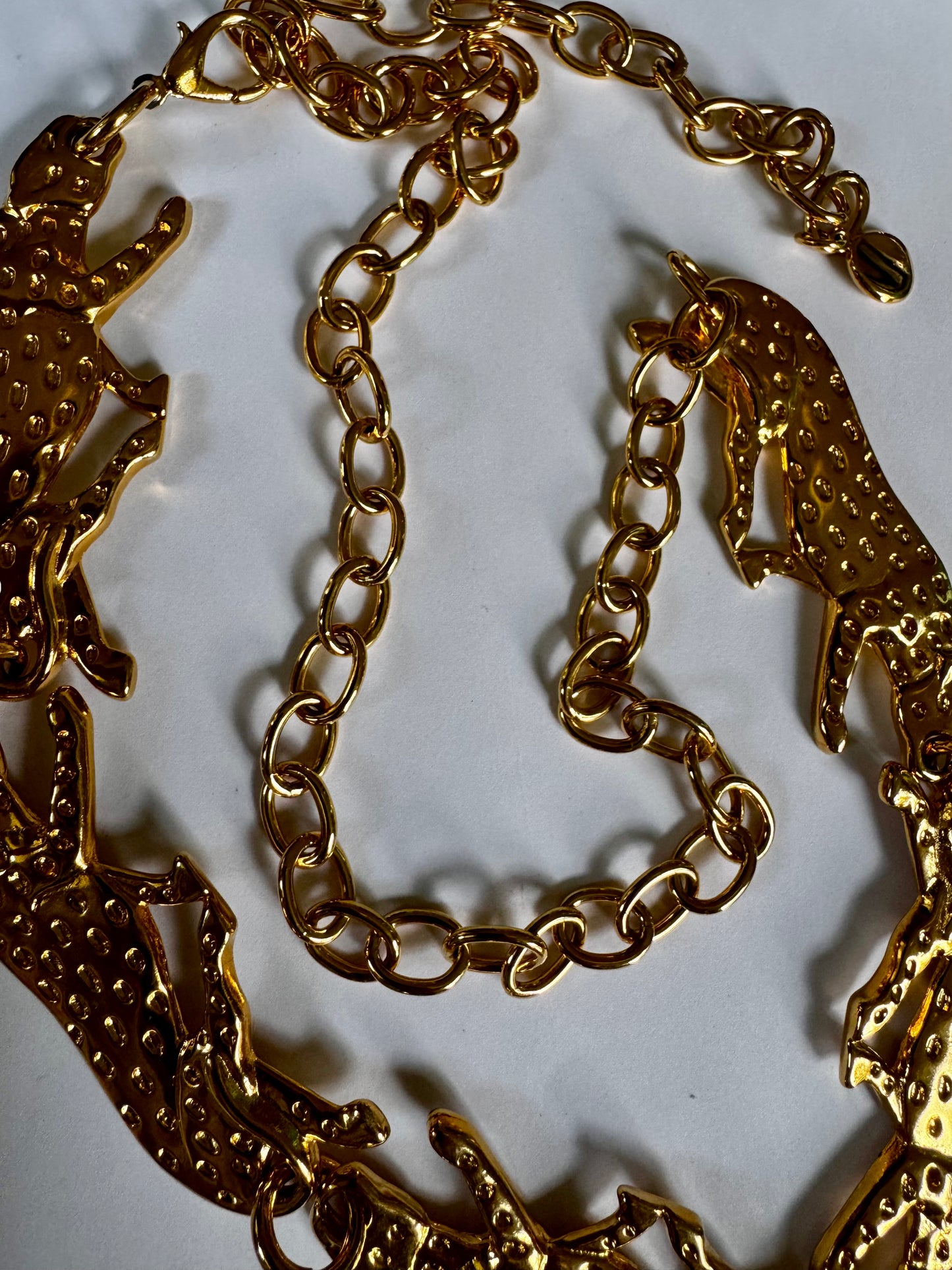 Vintage late 70s panther goldtone belt signed Bold Elegance on each animal