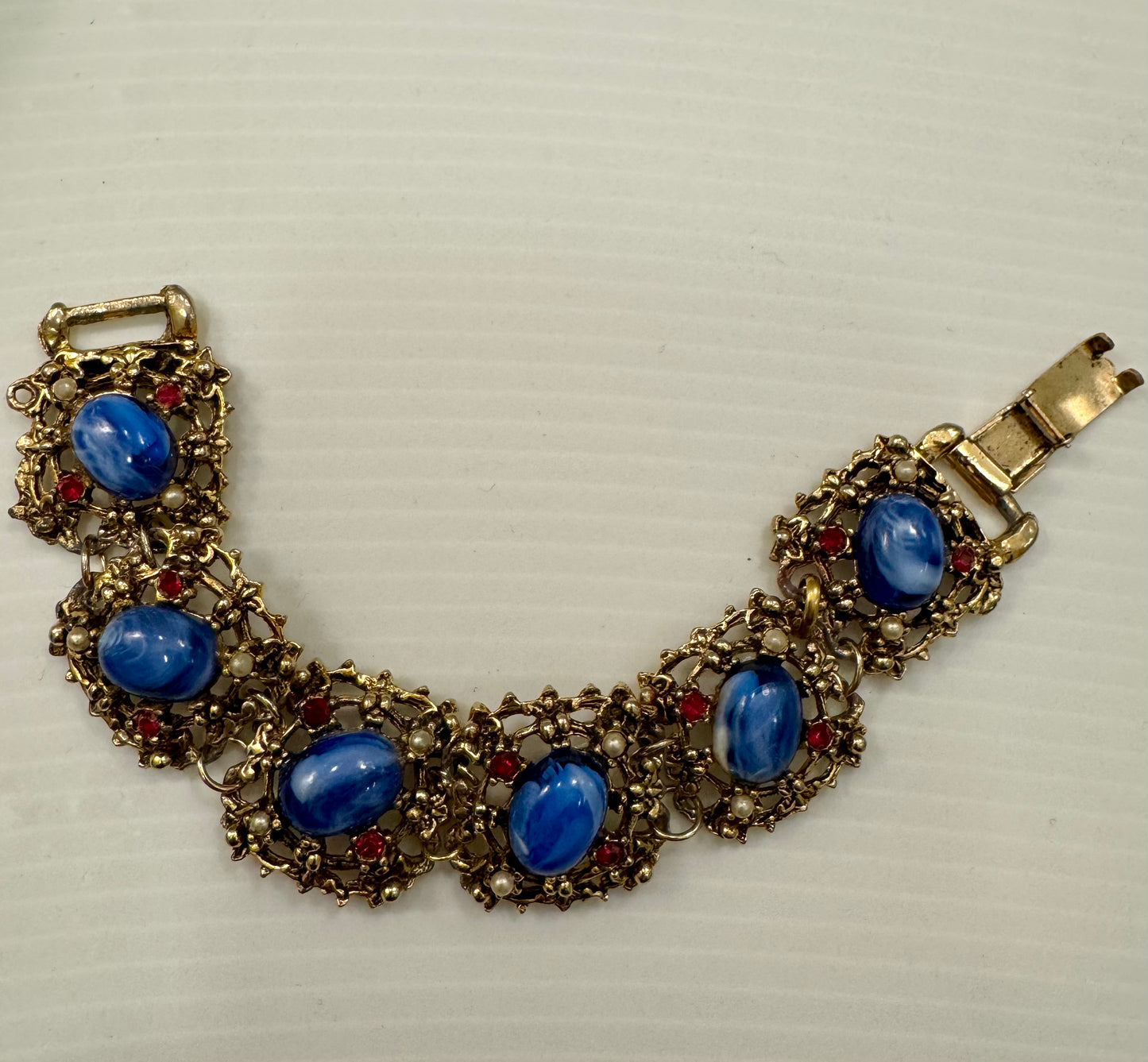 1950s goldtone with blue center stones pearl and red rhinestone bracelet