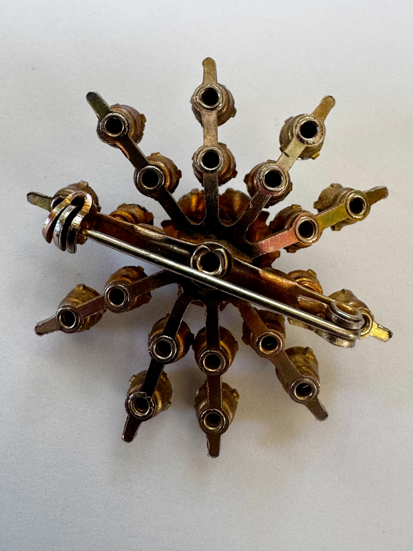Beautiful prong set crystal rhinestone Starburst brooch