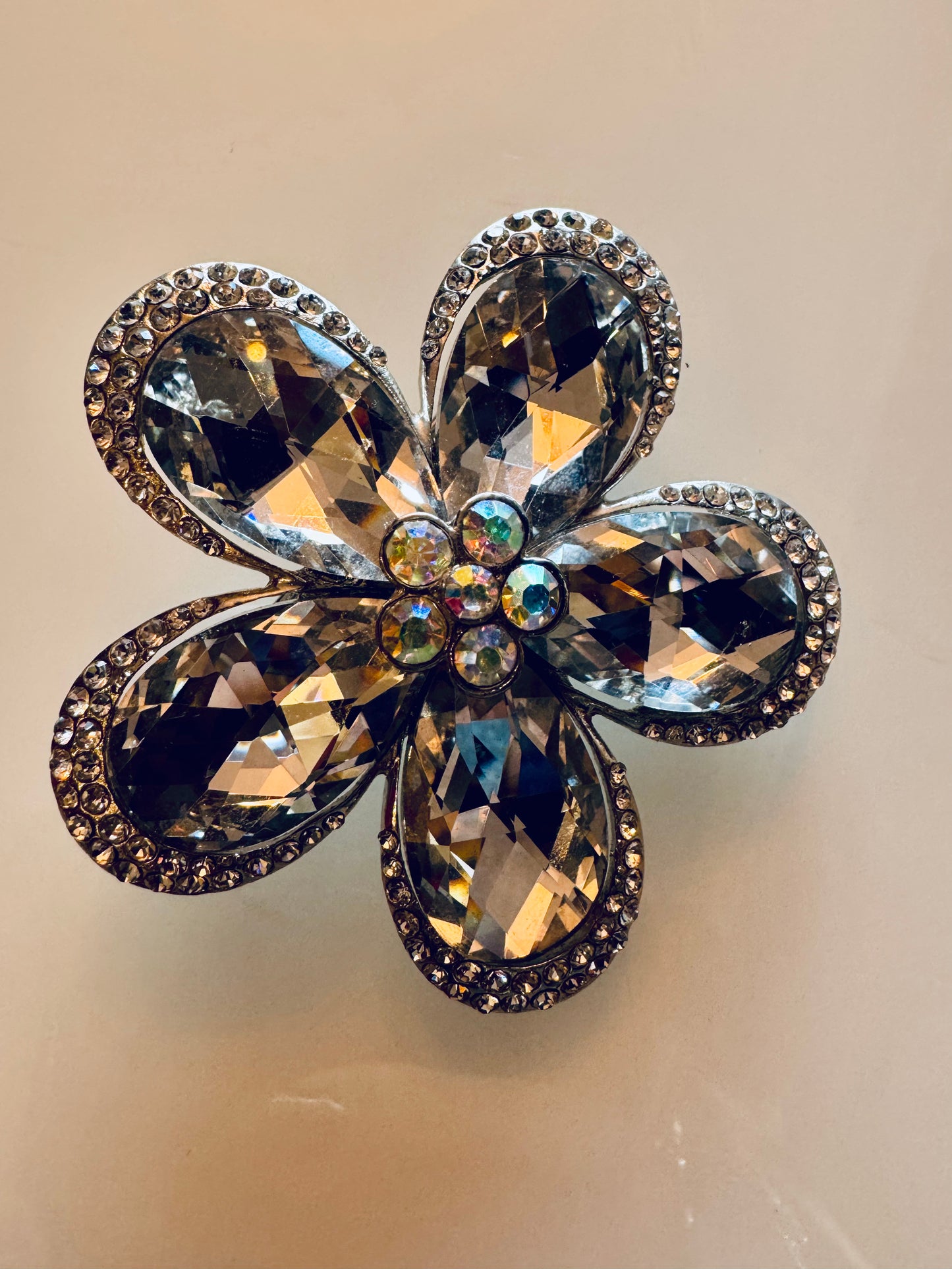 Rhinestone signed vintage flower brooch. Silver tone from 1980s Joan Rivers