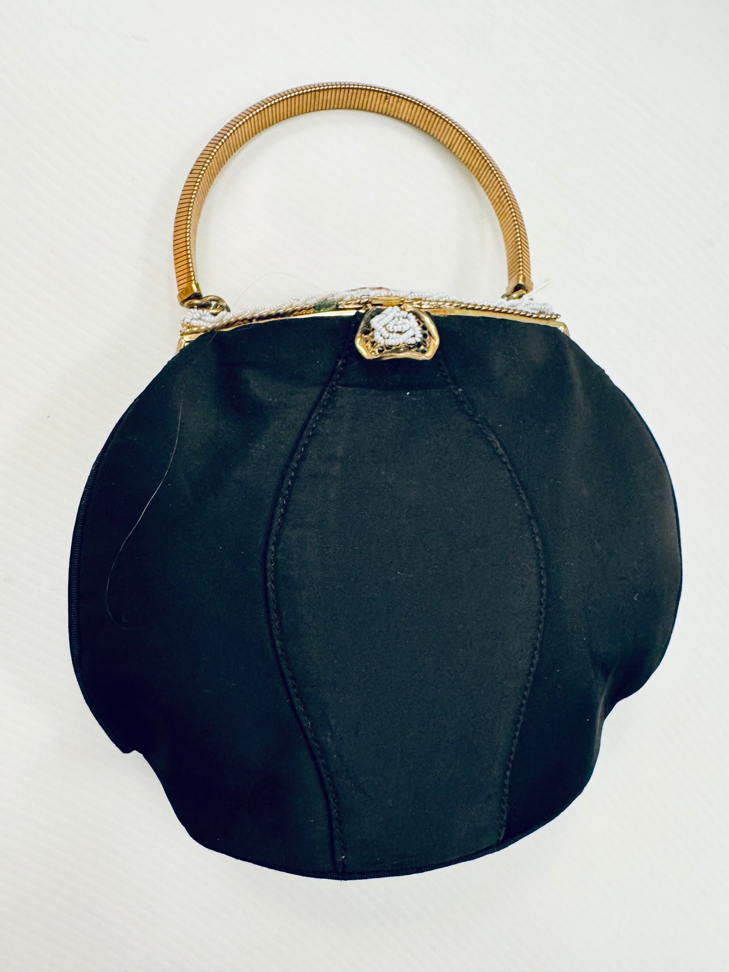 1940s black satin top handle handbag with decorative bead clasp and top design. Absolutely stunning!