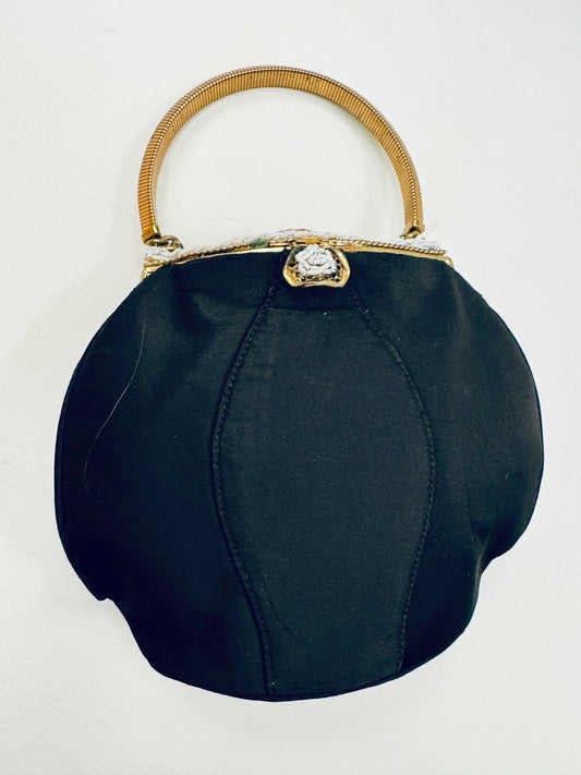 1940s black satin top handle handbag with decorative bead clasp and top design. Absolutely stunning!