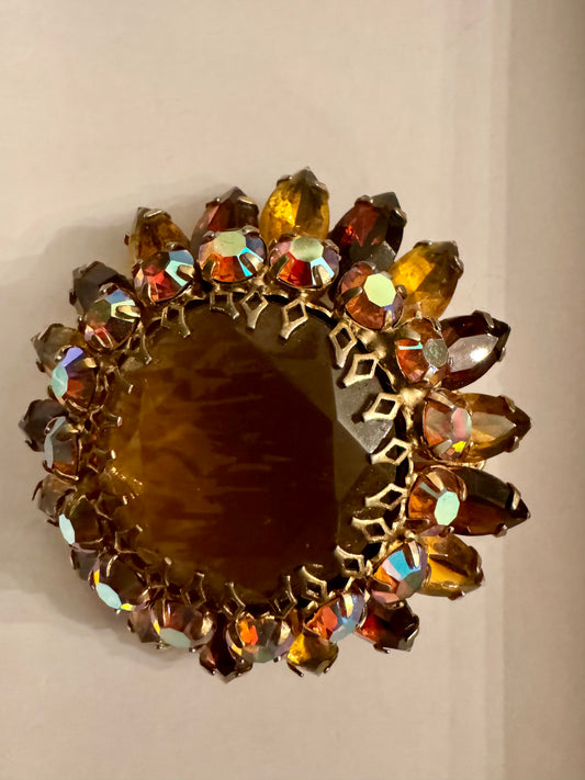 Amber colored rhinestone brooch