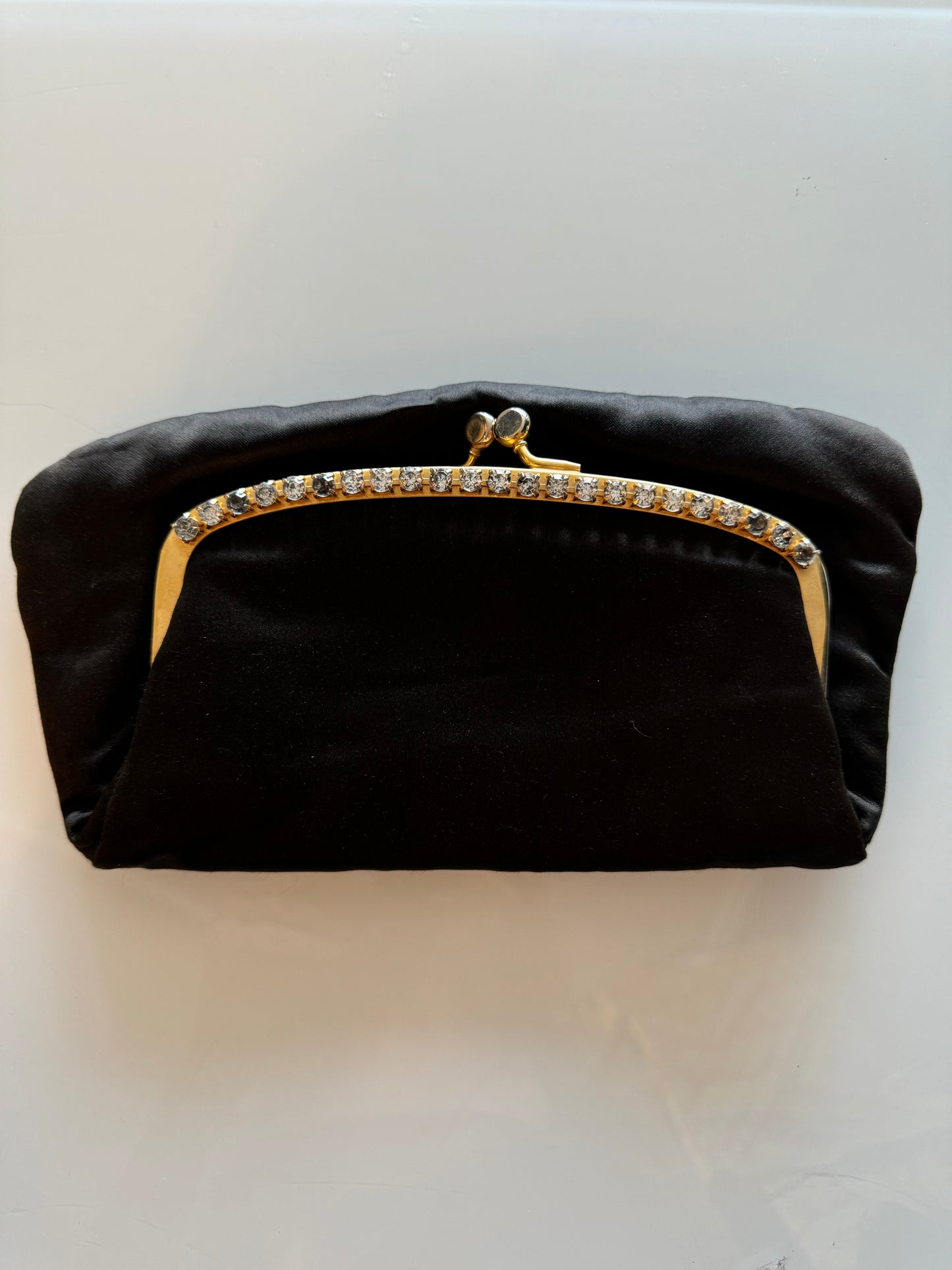 Gorgeous foldover  1950s satin black clutch with rhinestone hardware