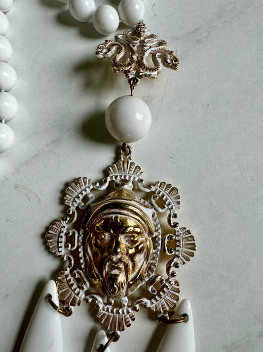 Medusa and snake white and gold tone pendant